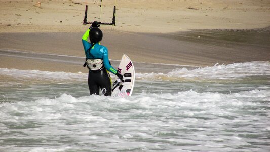 Sport woman kiteboarding photo