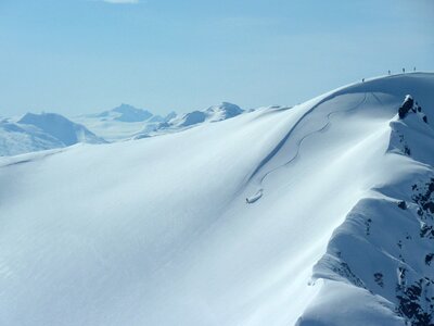 Heliskiing canada deep snow driving yukon territory