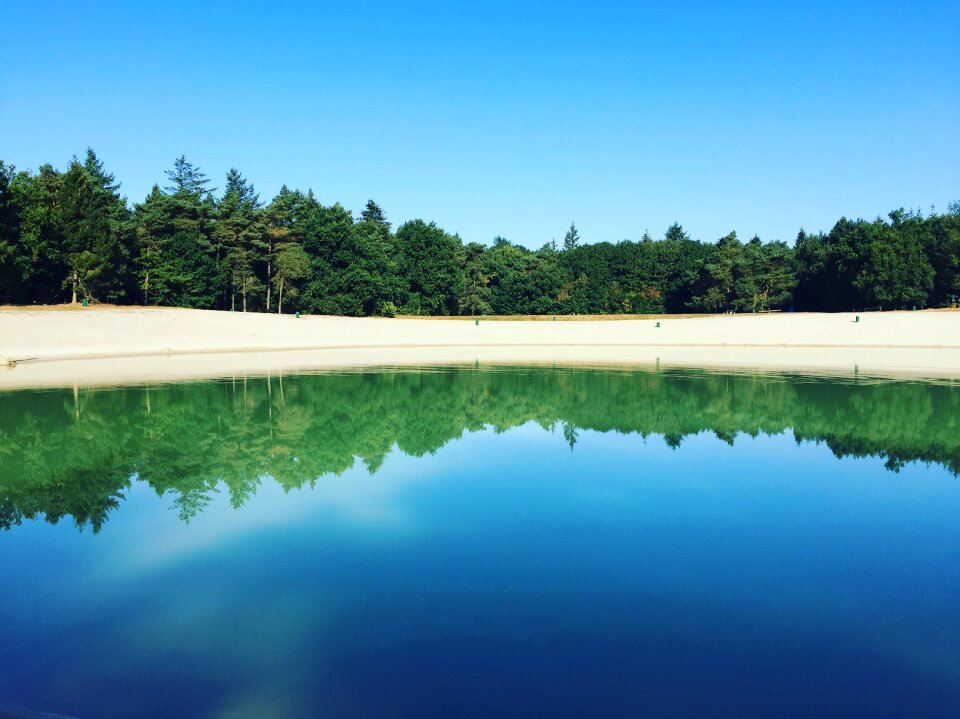 Blue sky beach mirror