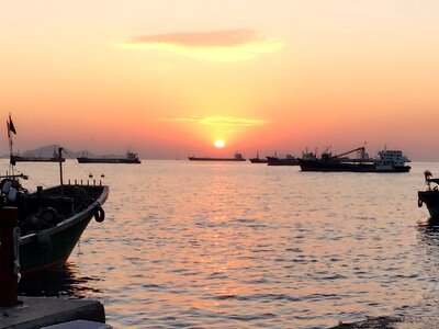 Sunset harbour fishing boats photo