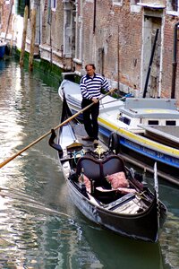 Italy gondolier taxi photo