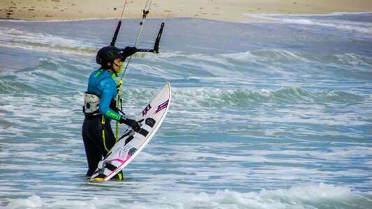 Sport woman kiteboarding photo