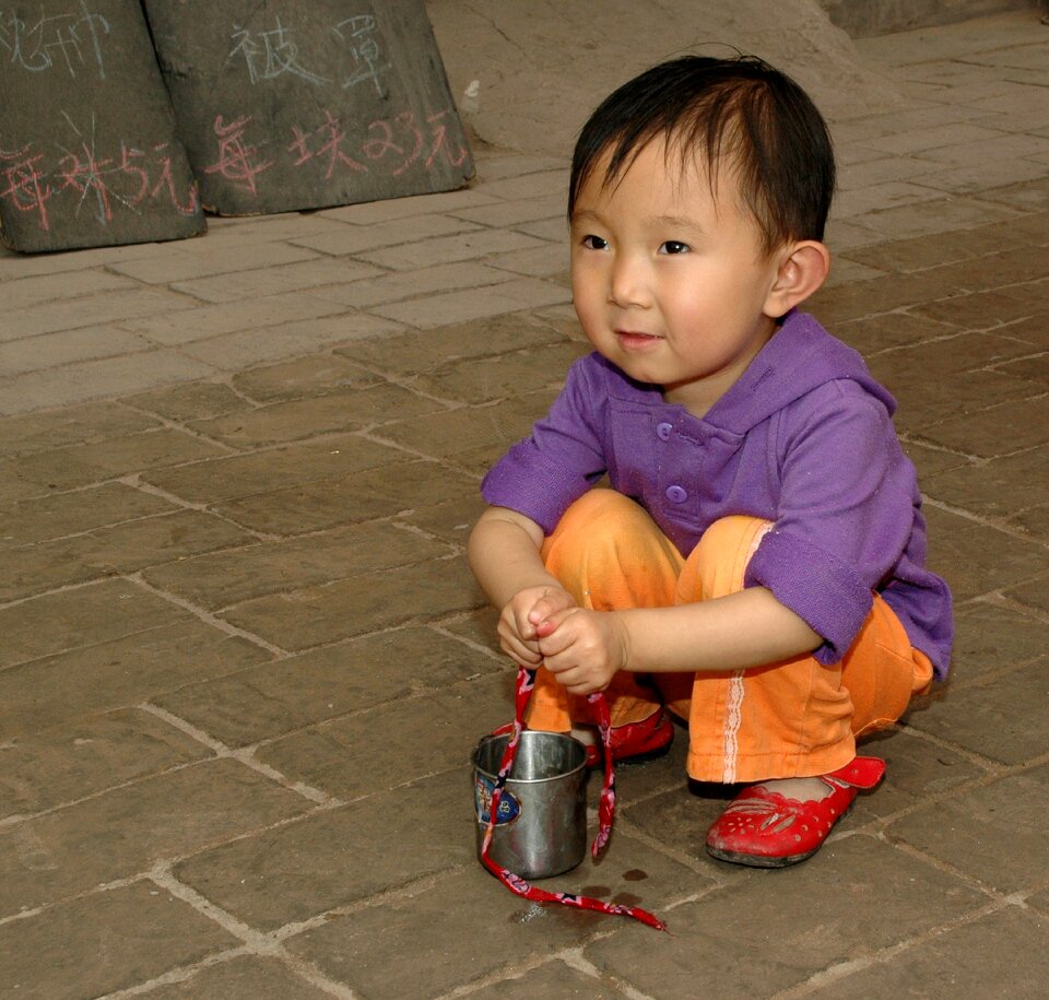 Child china crouched