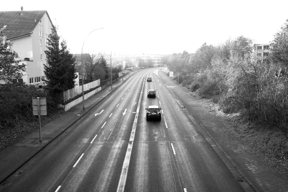 Vehicle driving a car black white