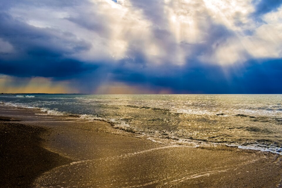 Sunbeam clouds beach