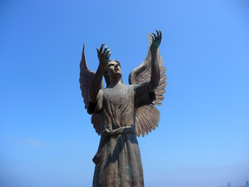 Angel of hope messenger of peace sculpture sculpture on the malecon
