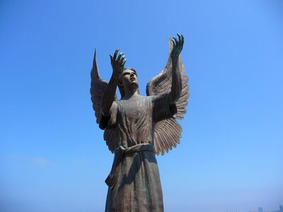 Angel of hope messenger of peace sculpture sculpture on the malecon
