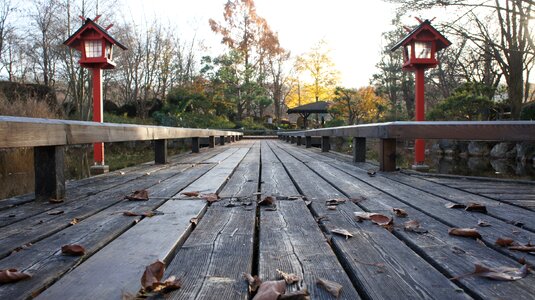 Wooden bridge pond boardwalk photo