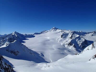 Snow-capped mountains stok austria photo