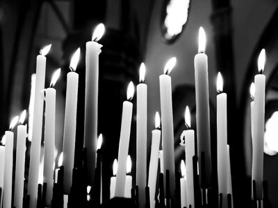Candles prayers black and white photo