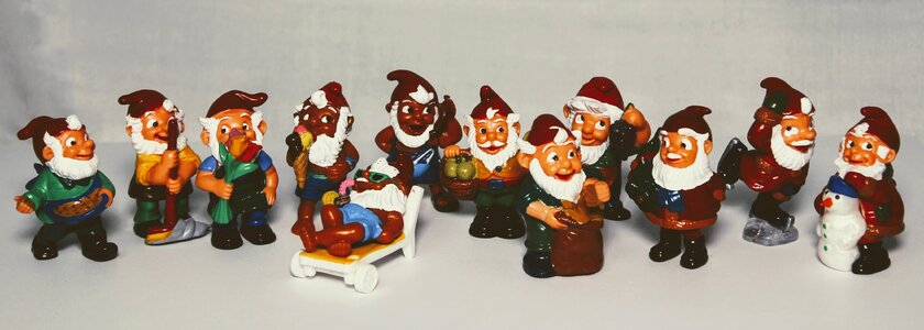 Kids surprise dwarfs garden gnomes
