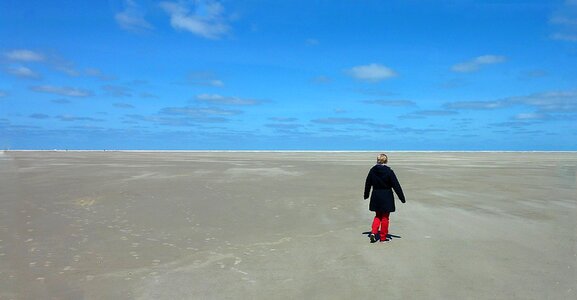 Sand sea woman photo