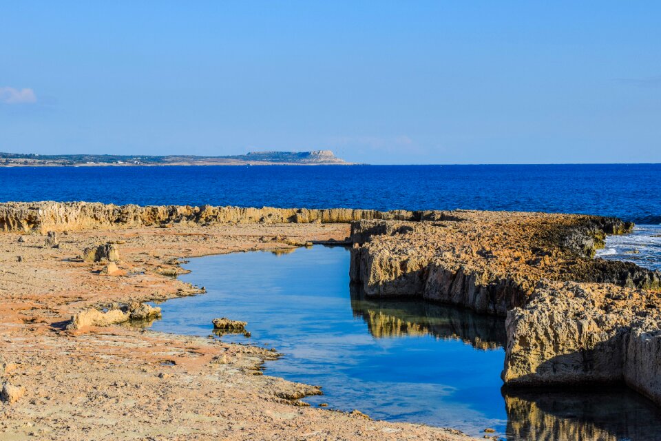 Rocky coast landscape reflections