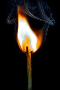 Smoke match burn photo