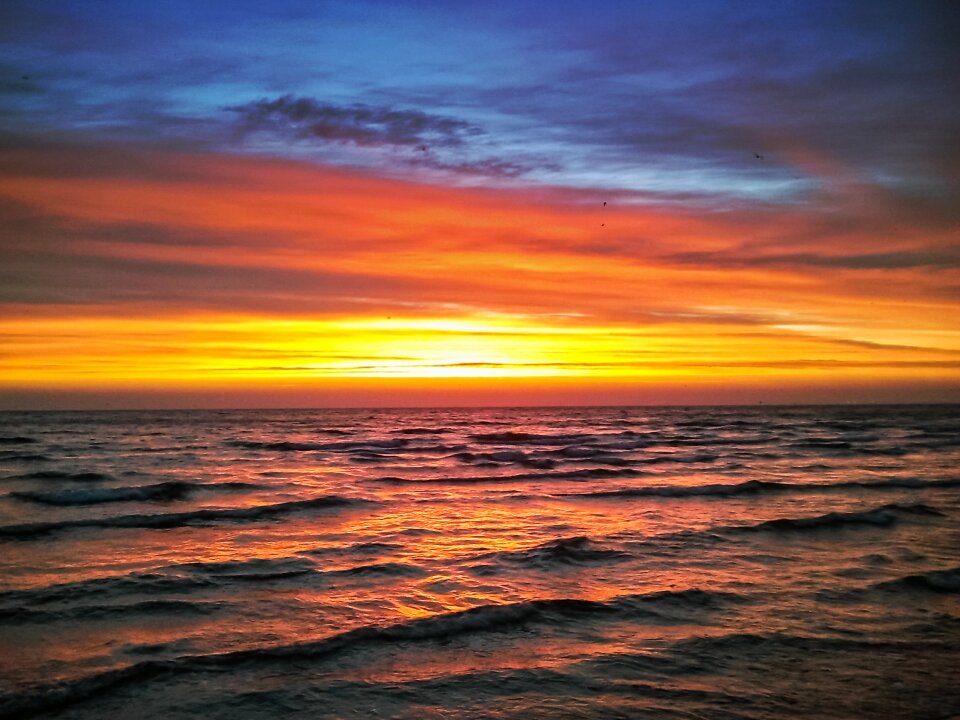 The sun east ocean