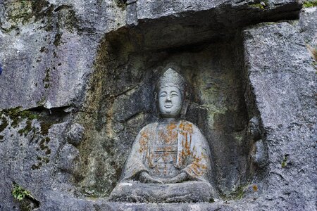 Stone carving statue buddhist photo