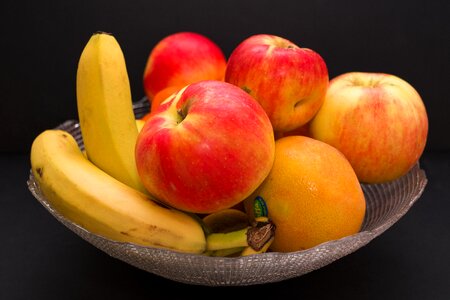 Banana orange red apple