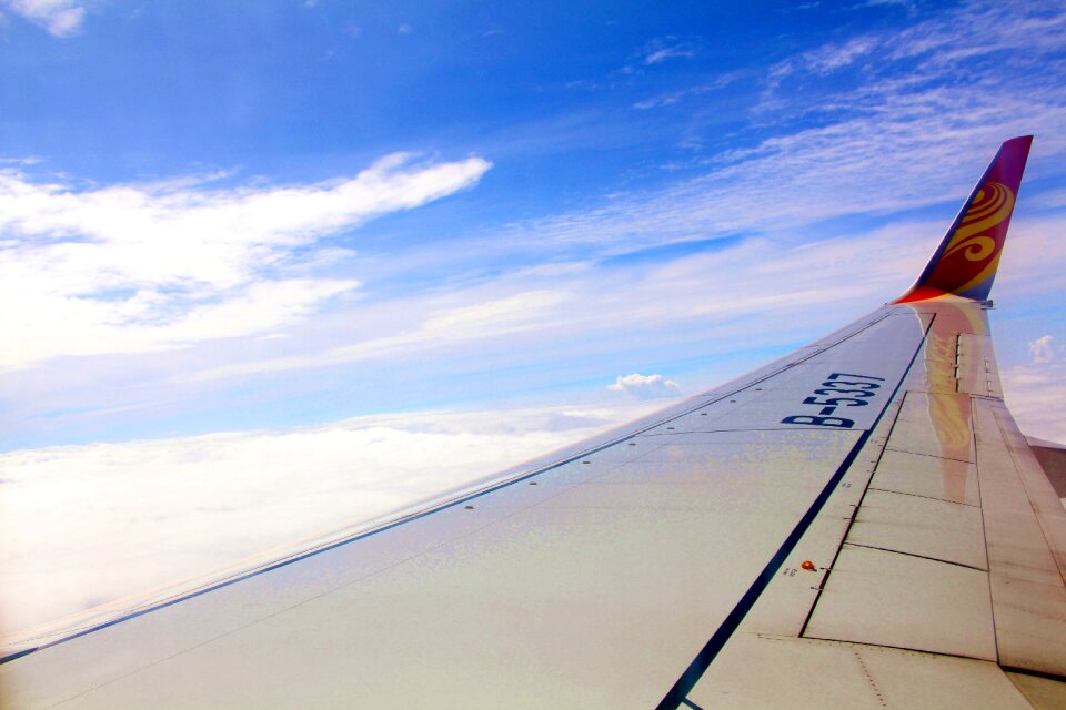 Aircraft wing blue sky