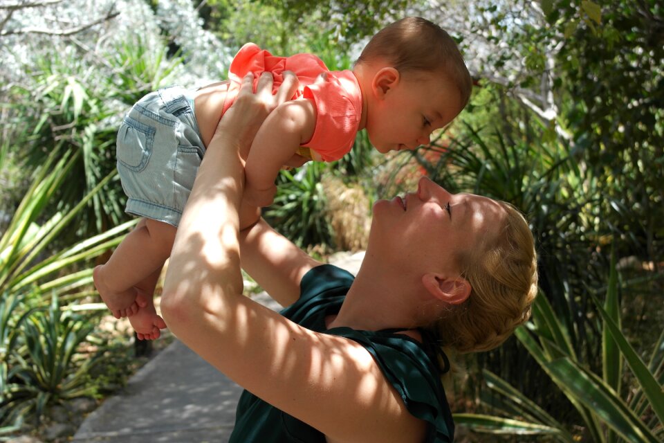 Baby woman kiss photo