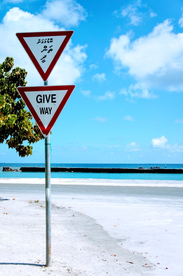 Beach road sign street sign