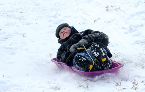 Sledding season fun photo