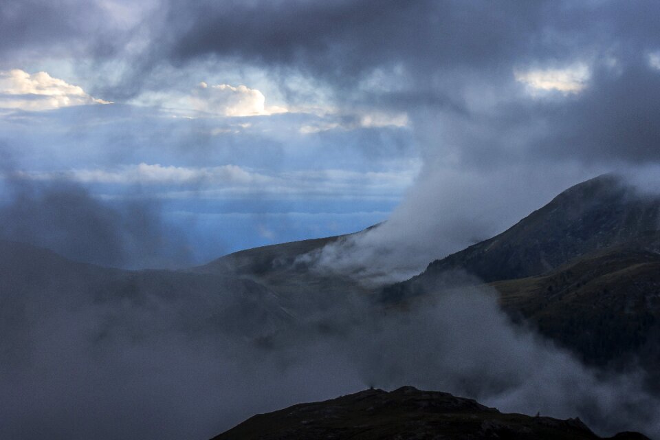Cloudy skies blue mist