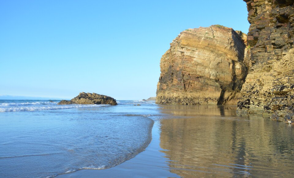 Rocks sand sky