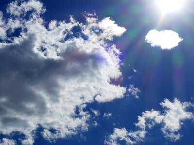 Rays blue white clouds photo