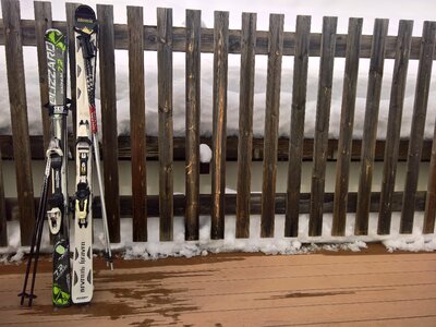 Skiing fence couple photo