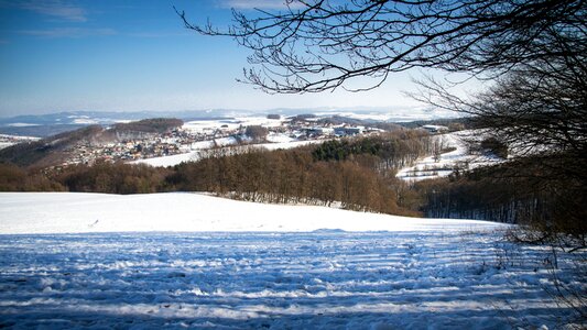 Winter sky meadow photo