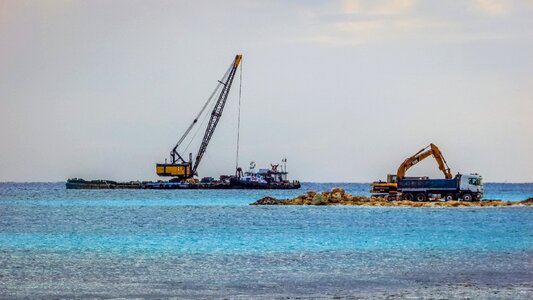 Floating platform dredging barge