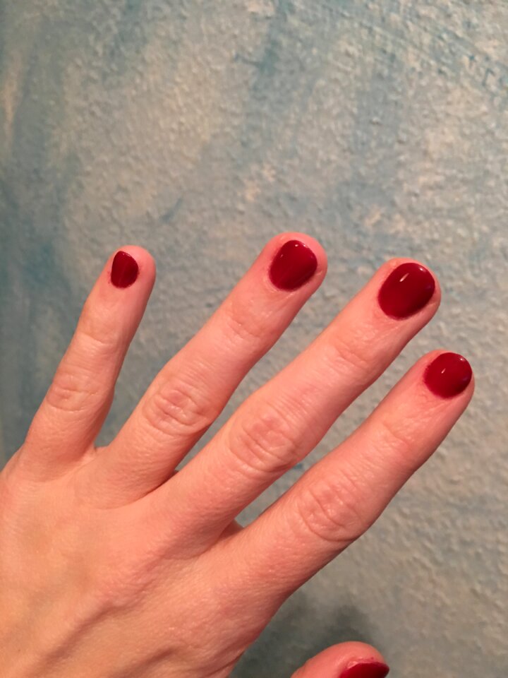 Red fingernails painted red