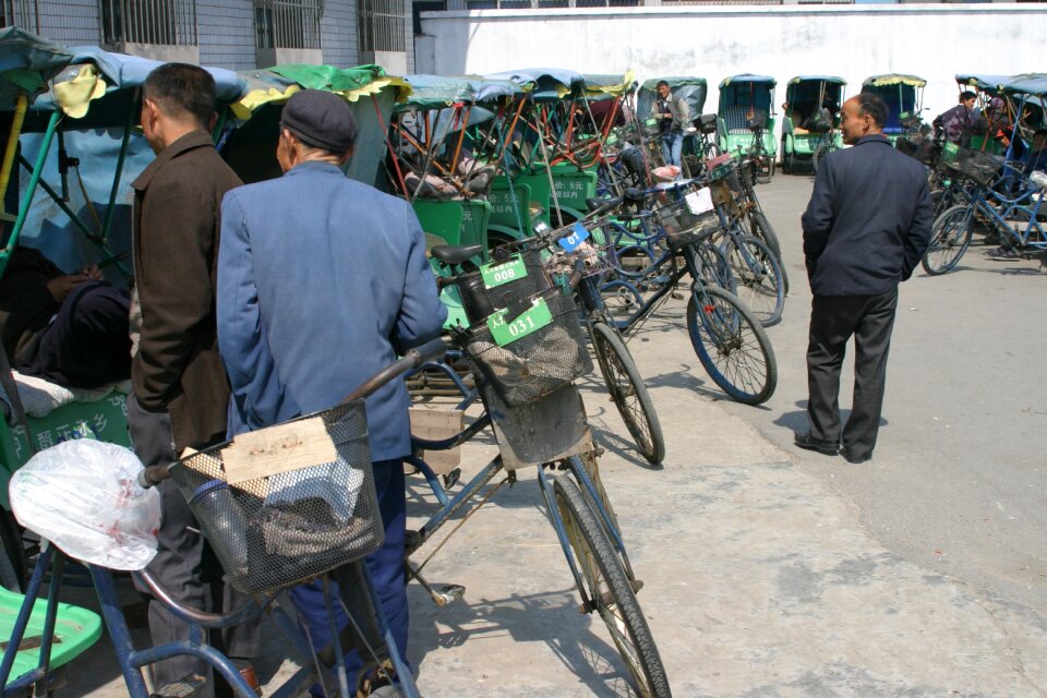 Bicycle rickshaw china bicycle taxi station