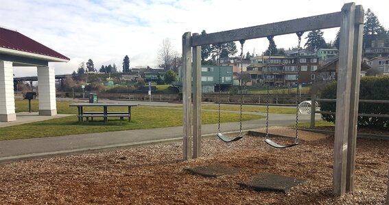 Playground childhood swinging photo