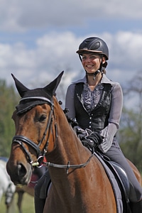 Cheerful ride equestrian photo