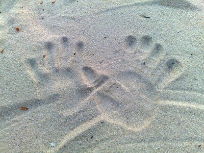 Couple holiday sand