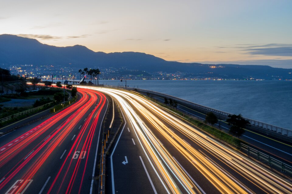 Sunset sea car lights