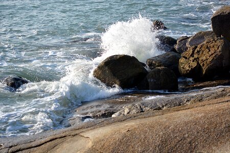 Rocks wind ocean photo