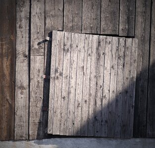 Crooked broken wooden boards photo