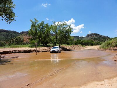 Off road water hole absorbed photo