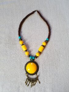 Beads and pendant yellow blue and brown necklace photo