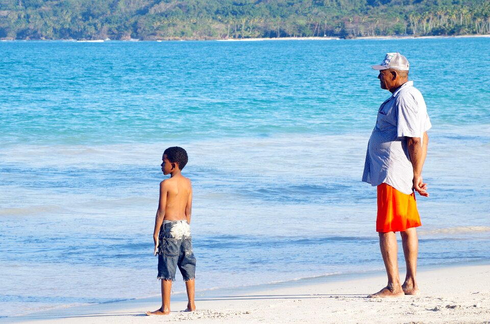 Blue children watching the sea man looking at sea