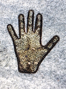 Stone hand symbol art