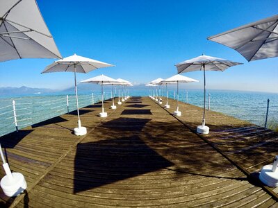 Wooden walkway lake garda garda photo