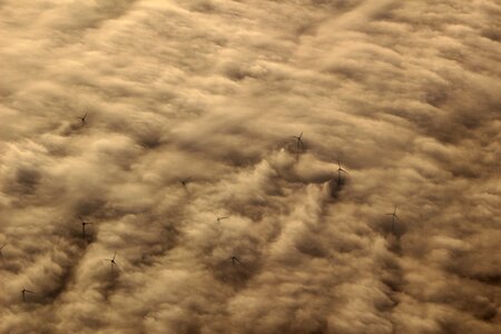 Wind power power supply above the clouds photo