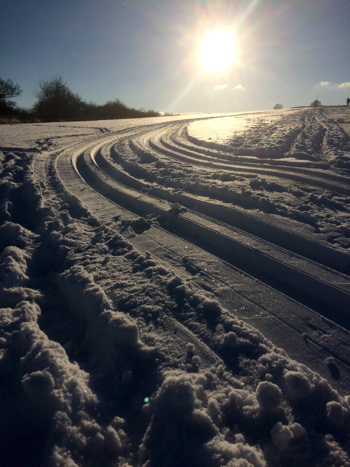 Winter sunny day ski tracks