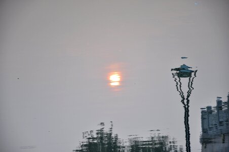 Reflection sunrise street lamp