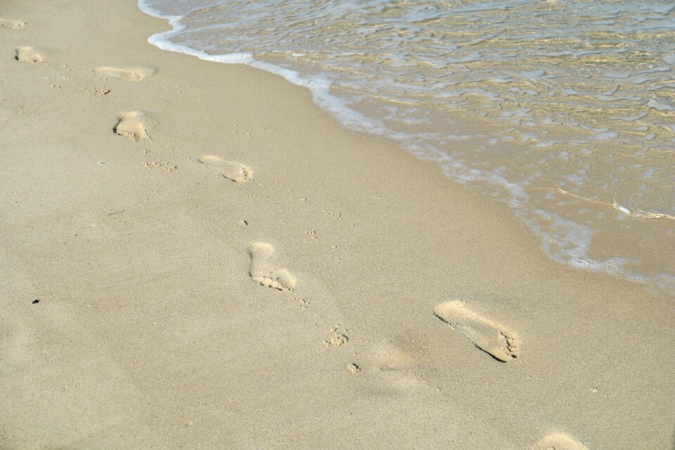 Sea traces beach sand