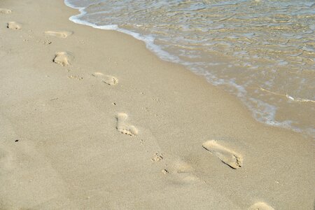 Sea traces beach sand