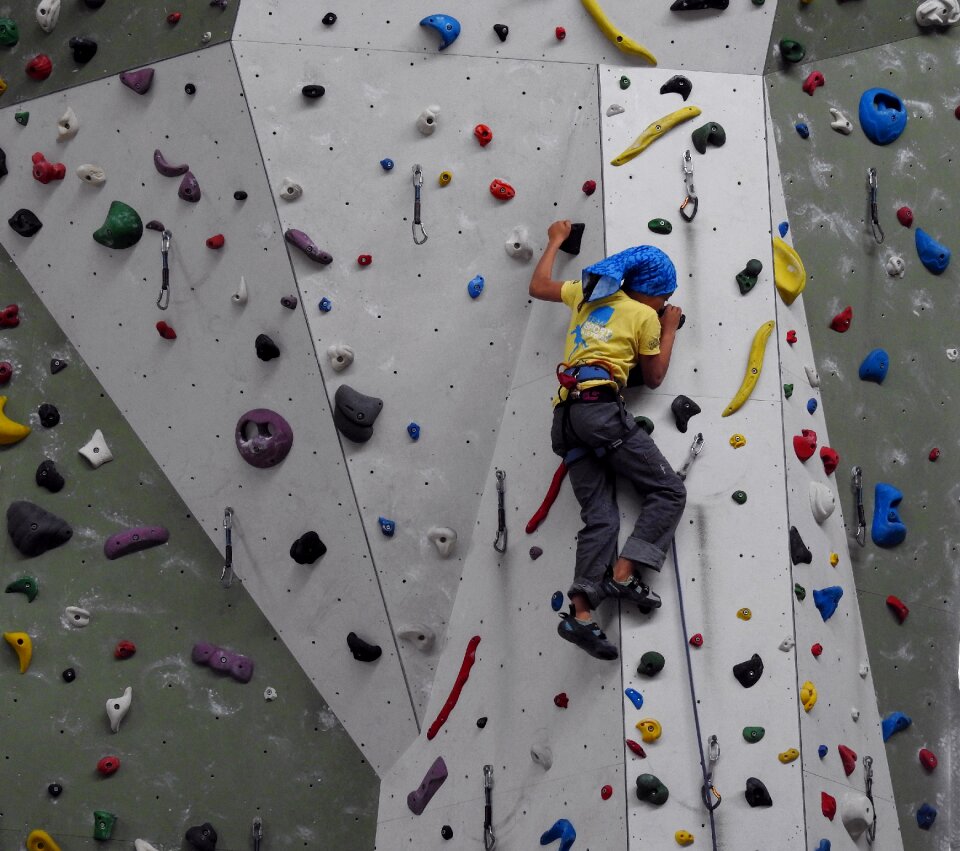 Artificial climbing wall climbing holds climber